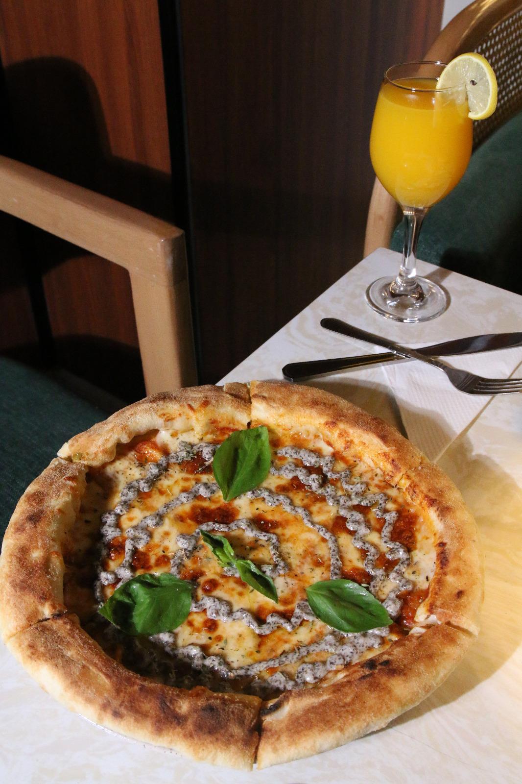 بيتزا ترافيل